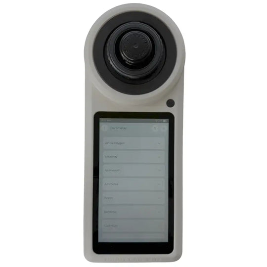 Handheld electronic device with a camera lens and digital display screen.