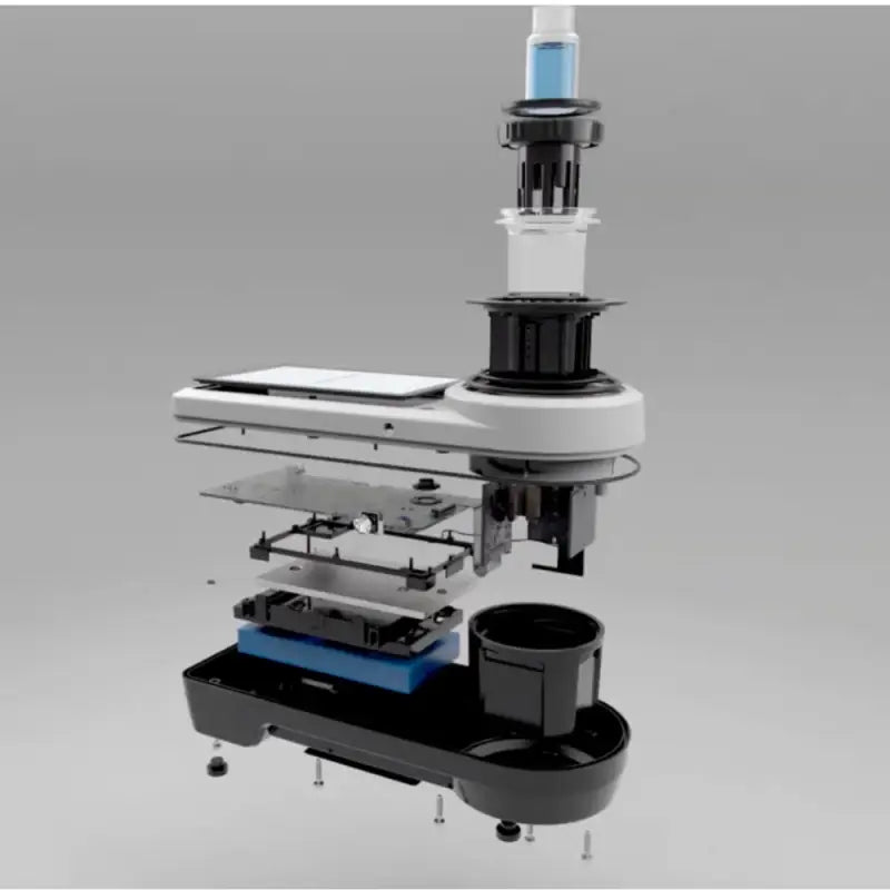 Exploded view of a microscope showing its internal components and layers.