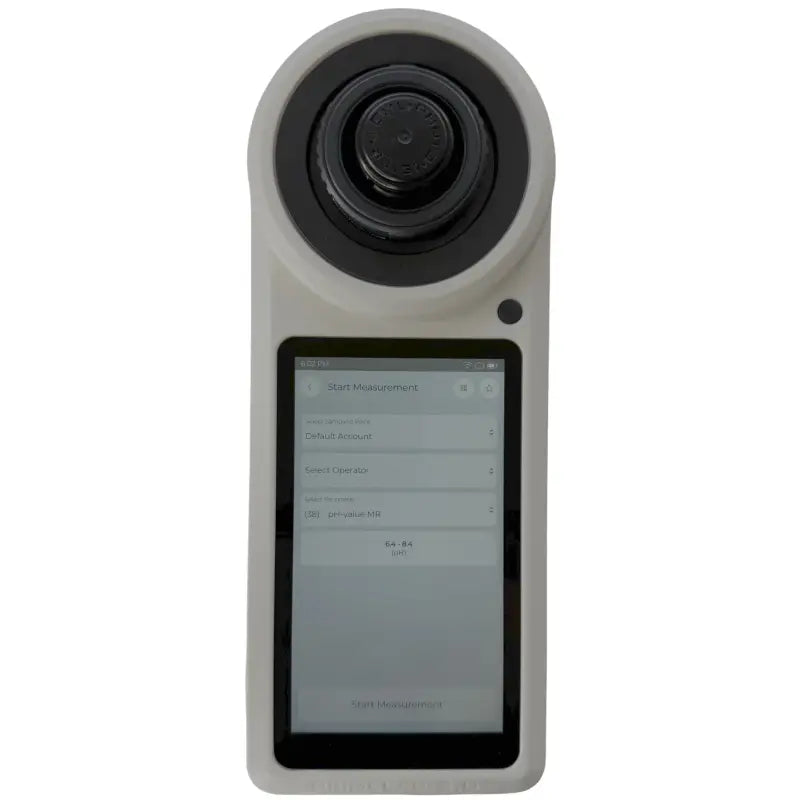 Handheld electronic device with a camera lens and digital display screen.